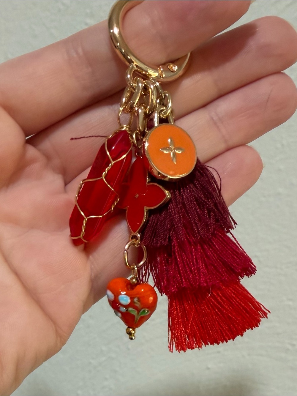 Gold Keyring Tassel Charm with Red and Orange Accents